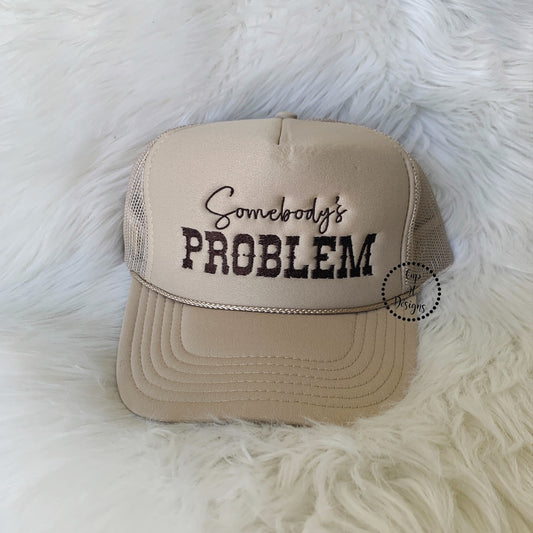 Somebody’s Problem Embroidered Trucker Hat